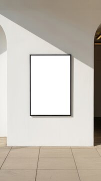 Vertical blank frame centered on white gallery wall oiu z j bf b qs cr j ougzk rq h a b m d9 c