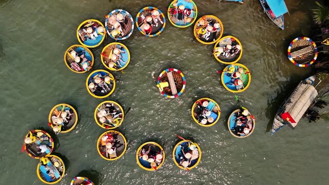 Aerial view of tourists in traditional vietnam basket boat in da nang, Vietnam