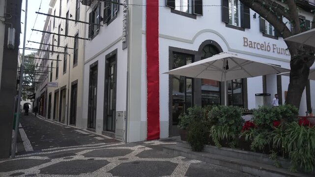 View of Christmas decor on restaurant on Antonio Jose de Almeida on a sunny day, Sao Martinho, Funchal, Madeira, Portugal