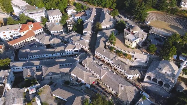 Top Down View of Gjirokast&euml;r&rsquo;s Cobblestone Street.  A vertical aerial view capturing the patterned cobblestone street of Gjirokast&euml;r framed by traditional stone rooftops. The geometric design and hist