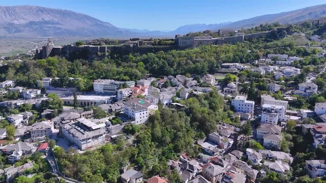 Aerial View of Gjirokast&euml;r&rsquo;s Stone Houses Beneath the Castle. . The historic townscape reflects its UNESCO-protected heritage and distinctive Ottoman-era architecture. Gjirokast&euml;r, Albania 11/28/2025