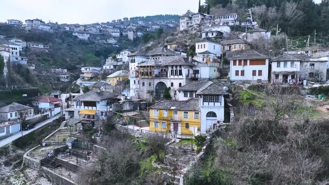 Top Down View of Gjirokast&euml;r&rsquo;s Cobblestone Street.  A vertical aerial view capturing the patterned cobblestone street of Gjirokast&euml;r framed by traditional stone rooftops. The geometric design and hist