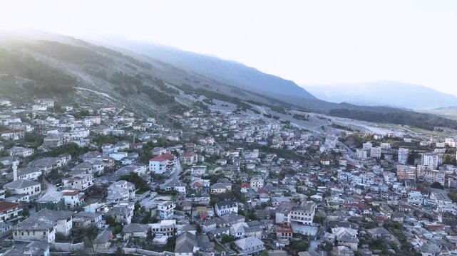 Aerial View of Gjirokast&euml;r&rsquo;s Stone Houses Beneath the Castle. . The historic townscape reflects its UNESCO-protected heritage and distinctive Ottoman-era architecture. Gjirokast&euml;r, Albania 11/28/2025