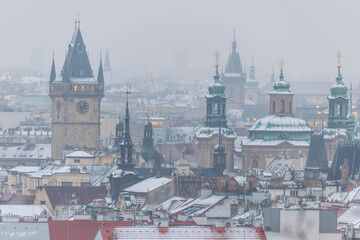 Fototapeta premium Winter view of Prague towers from Letná Gardens (Old Town Tower, National Museum, Týn Church..) capital city Czech Republic