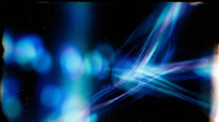 Obraz premium Abstract blue cyan light streaks crossing bokeh blobs vintage scratched film grain dark black background