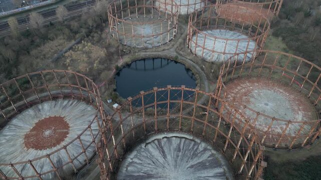 Aerial view documenting the Bromley-by-Bow gasholders, seven Victorian iron frames in Twelvetrees Crescent, West Ham, East London.