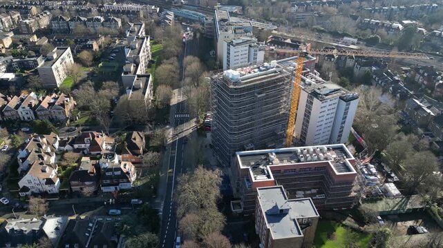 Aerial view of Windmill Court on Shoot Up Hill in Kilburn, London, documenting local housing density and street traffic from above.
