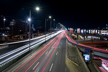 Nighttime Long Exposure Photo of Belgrade Bridge with Light Trails