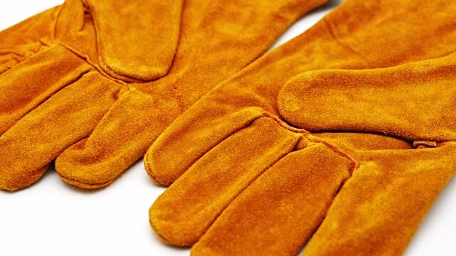 Fireproof gloves shown from multiple angles on a white surface