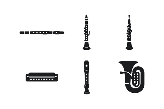 Collection of wind and reed musical instruments in silhouette, isolated on white background