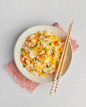 Egg fried rice with vegetables, Chinese food, top view 