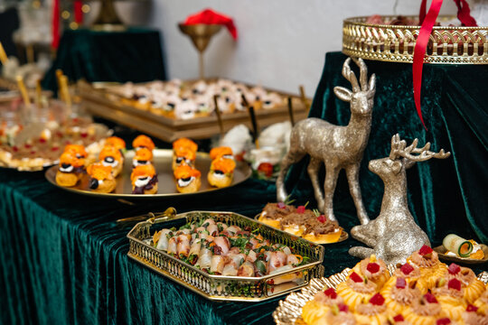 Festive holiday buffet table offering delicious gourmet appetizers