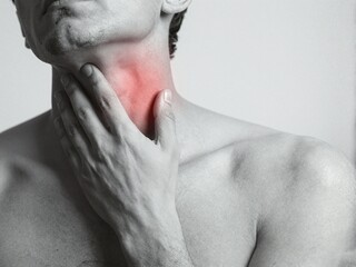 Naklejka premium Man Clutching Painful Neck in Monochrome Medical Concept