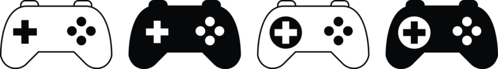 Four black and white game controllers with plus signs and buttons gaming © Sumi