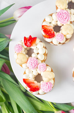 Top view of Women's day cake in the shape of number eight. 8 March concept. International women's day