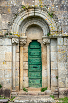 Exquisite 12th-century Romanesque south portal of Santa Maria de Herbon church with decorated archivolts and granite columns, Padron, Galicia, Spain