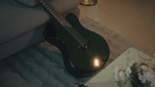Peaceful Depiction Of Musical Instrument Beside Illuminating Lamp And Decorative Florals At Night