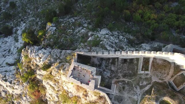 Drone flight above the walls of an old medieval Ljubushki Fortress Herceg Stjepan , Europe, Bosnia and Herzegovina.