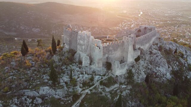 Drone flight above the walls of an old medieval Ljubushki Fortress Herceg Stjepan , Europe, Bosnia and Herzegovina.