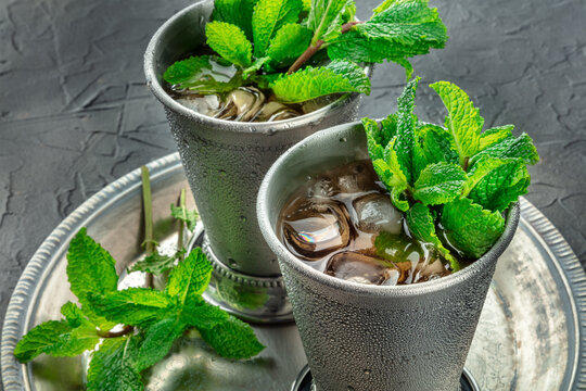 Mint Julep cocktail in the Kentucky Derby classic silver glass, with fresh mint