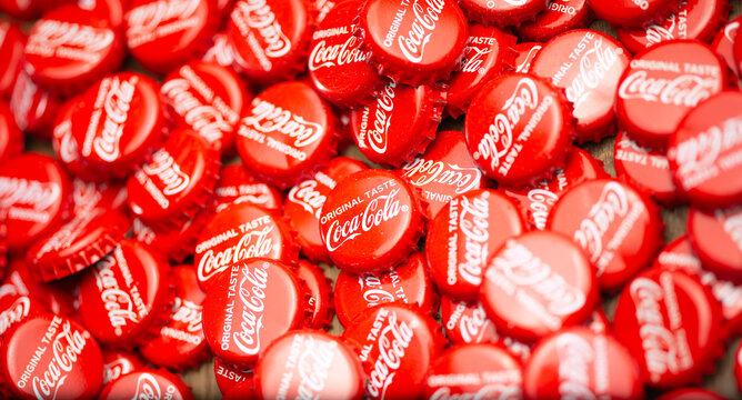 Studioshot of red Coca Cola Coke lemonade bottle caps
