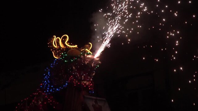 Chinese dragon performing at night.