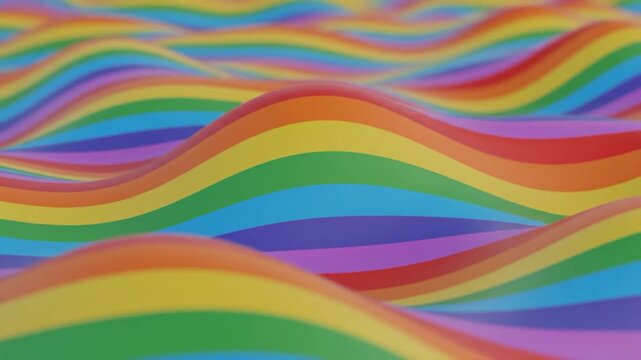 Vibrant rainbow colored waves create an abstract undulating background