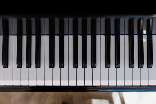Top Down View of Piano Keyboard with White and Black Keys Instrument