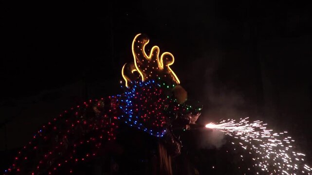 Chinese dragon performing at night.