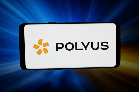 Stuttgart, Germany - 02-27-2026: In this photo illustration, the logo of Russian gold mining company PJSC Polyus is displayed on a smartphone in front of abstract background on computer screen.