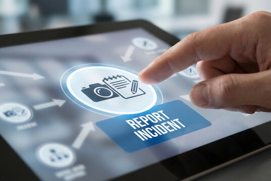 A hand interacting with report incident application for the concept of technology and communication.