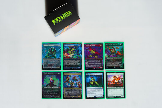 Close-up of new Teenage Mutant Ninja Turtles cards of Magic the Gathering card game against white background. Photo taken March 2nd, 2026, Zurich, Switzerland.
