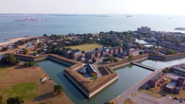 Historic Fort Monroe in Hampton, Virginia, aerial video of the star-shaped stone walls and water-filled moat 