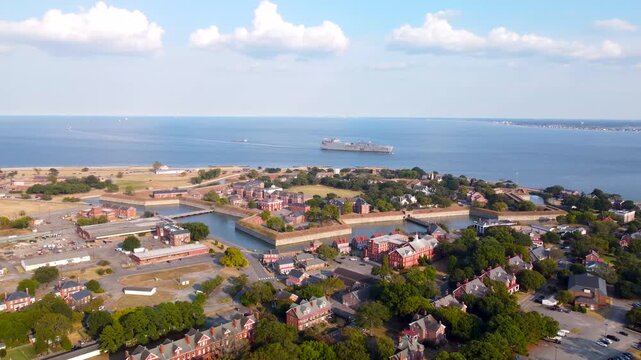 Historic Fort Monroe in Hampton, Virginia, aerial video of the star-shaped stone walls and water-filled moat 