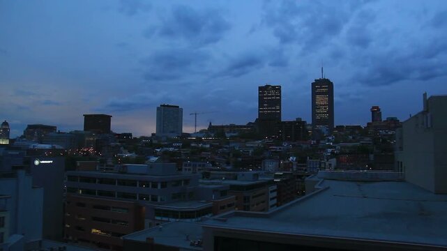 Buildings and urban residential dwellings in Quebec City, Quebec, Canada during evening dusk, night.