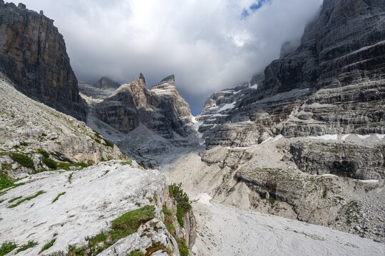 Mountain valley, Castelletto Superiore and Cima Sella peaks, back Scharte Bocca di Tuckett, dramatic atmosphere in the Brenta Mountains, Brenta, Brenta-Adamello Natural Park, Trentino, Italy