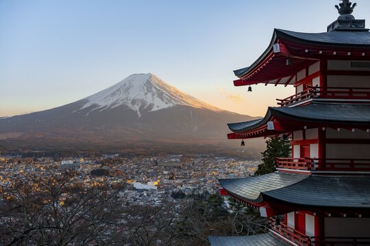 Five-story pagoda of a Shinto Shrine, Chureito Pagoda, with views of Fujiyoshida City and Mount Fuji volcano at sunset, Arakura Fuji Sengen Shrine, Arakurayama Sengen Park, Yamanashi Prefecture, Japan