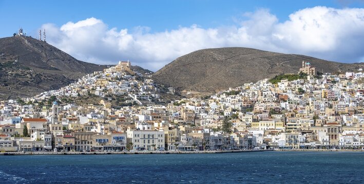View of the town of Ermoupoli, on the hill the Basilica of San Giorgio in Ano Syros, and Anastasi Church or Church of the Resurrection, Syros, Cyclades, Greece