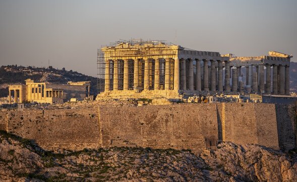 Parthenon Temple, ancient tourist landmark on the Acropolis of Athens, dusk, Athens, Greece