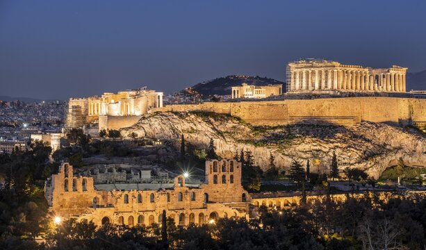 View of the Acropolis from Philopappos Hill, blue hour, illuminated Parthenon Temple and Herod's Amphitheatre, Acropolis, Athens, Greece
