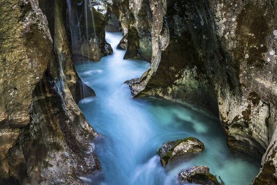 Mountain river Soca flows through narrow canyon, Soca Valley, Triglav National Park, Bovec, Slovenia