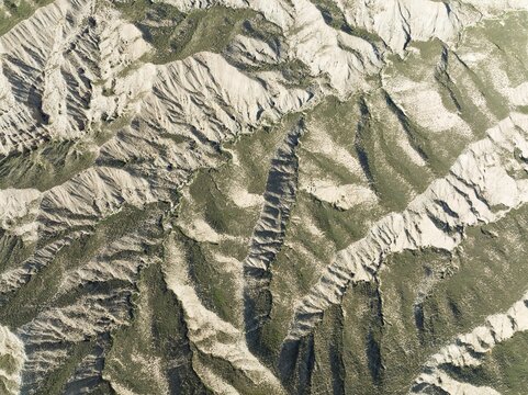 The Gorafe Desert with green surroundings after some rainfalls, aerial view, drone shot, UNESCO Granada Geopark, Granada province, Andalusia, Spain