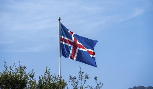Icelandic flag, flag waving in the wind, Camping B&aacute;sar in the Icelandic Highlands, &THORN;&oacute;rsm&ouml;rk, Su&eth;urland, Iceland