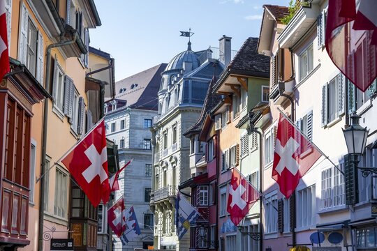 Old Town of Zurich, with Swiss Flags, Zurich, Switzerland