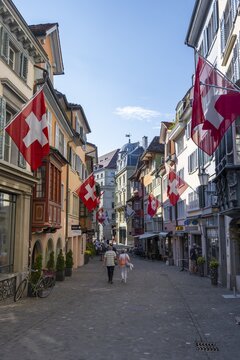 Old Town of Zurich, with Swiss Flags, Zurich, Switzerland
