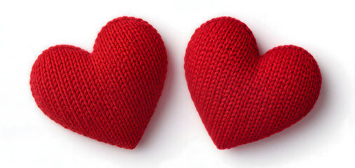 Two red knitted hearts lying on white background for valentines day wedding celebration love concept handmade craft wool texture romantic holiday