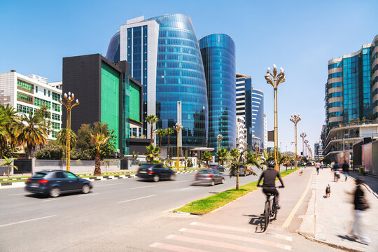 Vibrant Addis Ababa's skyline with sleek glass towers and ornate golden streetlights
