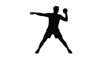 A handball player preparing to throw captured in stark silhouette