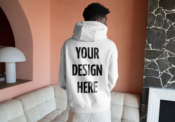 Mockup Of Man Wearing Customizable Hoodie, Rear View