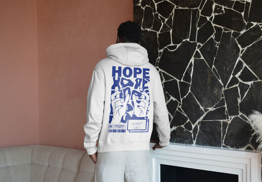 Mockup Of Man Dressed In Customizable Hoodie, Rear View